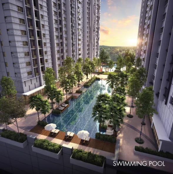 Akasa Cheras South The image shows a swimming pool area between two high-rise buildings, with trees and lounge chairs around the pool. in Cheras, Freehold property development, render