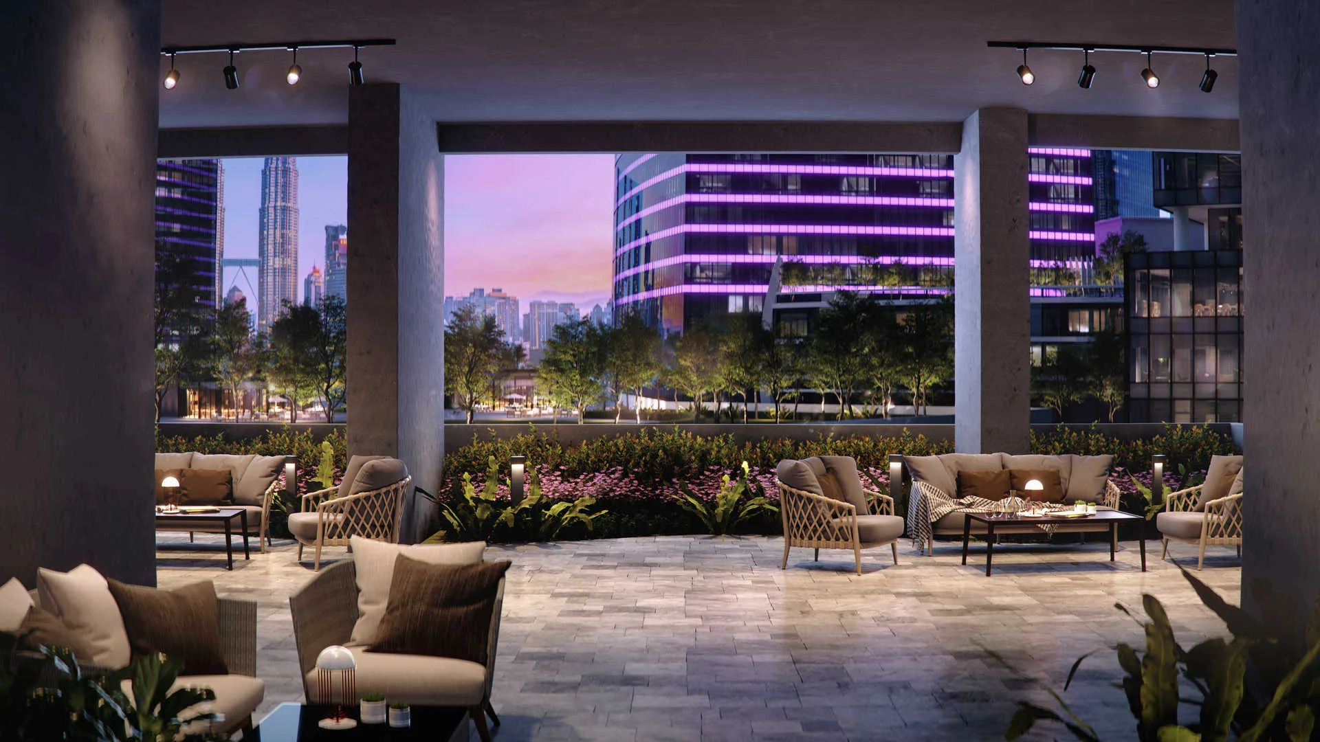 Core Residence at TRX Outdoor lounge area with seating and city view at night, Freehold property development, render