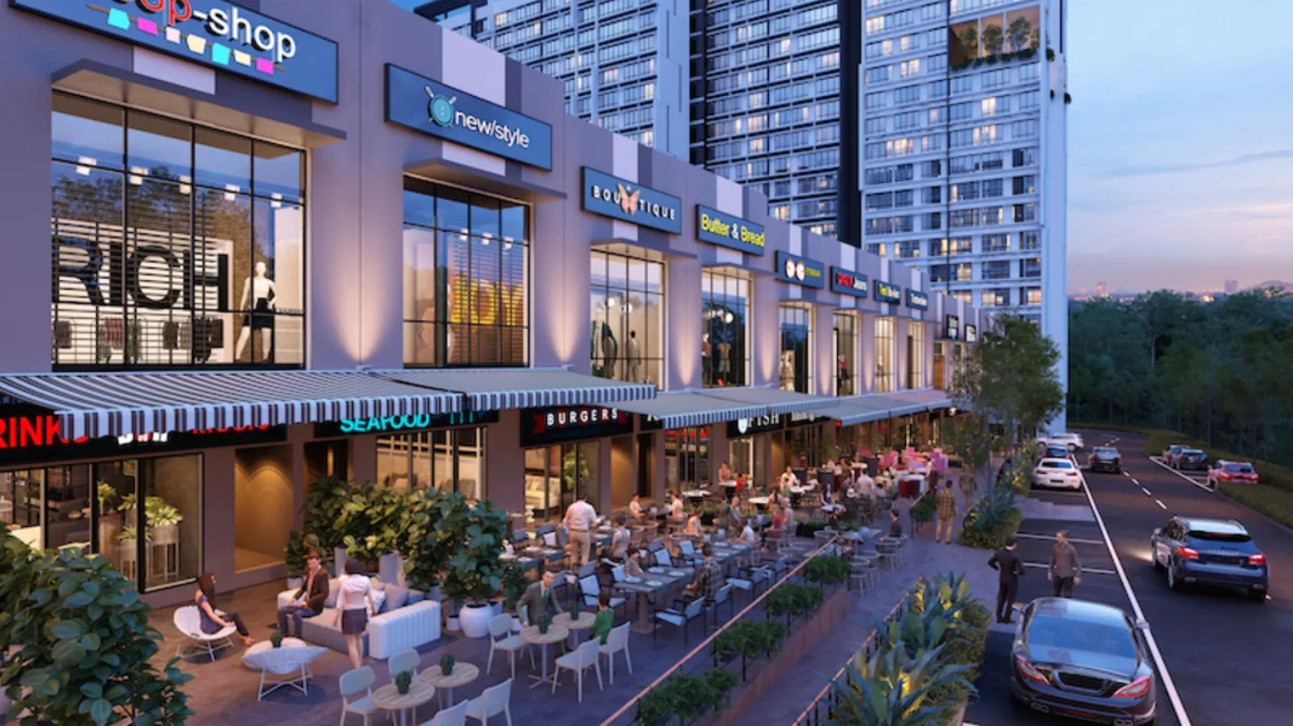 Gamuda Gardens Exterior view of retail shops with outdoor seating and a residential tower in the background. in Rawang, Leasehold property development, render