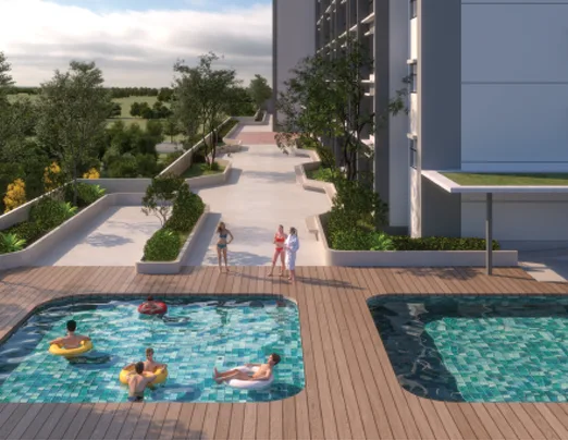 Kamelia - Bandar Sri Damansara The image shows a swimming pool area with people swimming and relaxing, adjacent to the building exterior. in Bandar Sri Damansara, Freehold property development, render