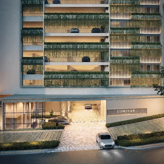 Subang Freehold Township Project Building exterior showing the entrance and parking levels with greenery in Subang Jaya, Freehold property development, render