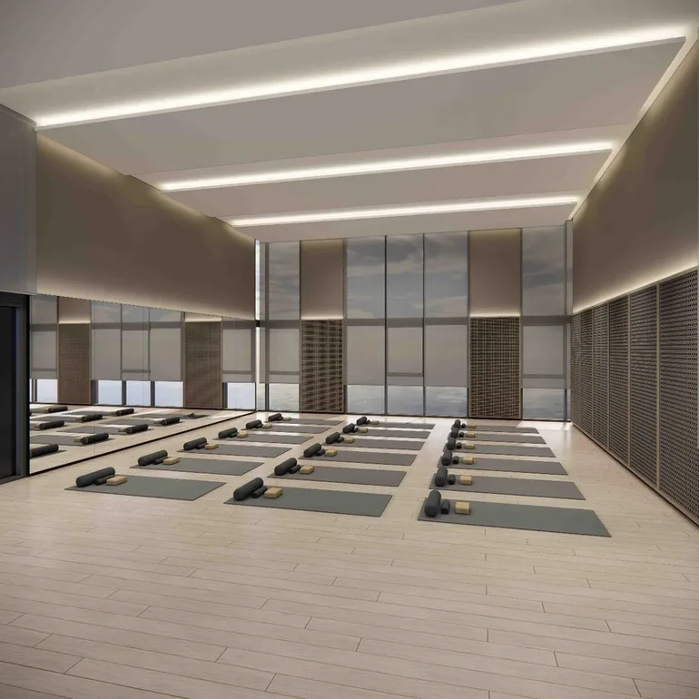 REN Residence The image shows the interior of a yoga studio with mats and rollers laid out on the floor. in Bukit Jalil, Leasehold property development, render
