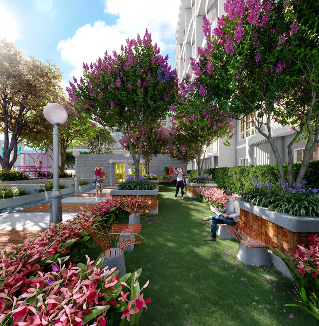 Stallionz This image shows a render of the outdoor garden area of Stallionz in Ipoh, featuring lush greenery, flowering trees, seating areas, and people enjoying the space. in Ipoh, Leasehold property development, render