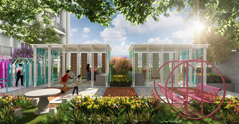 Stallionz Image shows a playground area with colorful structures and seating, including a circular swing and a table with stools. in Ipoh, Leasehold property development, render